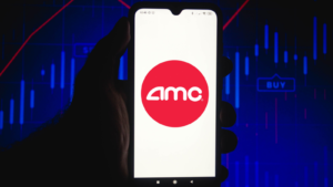 In this photo illustration the AMC Entertainment Holdings logo seen displayed on a smartphone screen