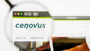 The website for Cenovus Energy (CVE) seen through a magnifying glass.
