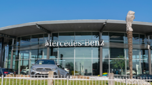 Mercedes-Benz, AMG car showroom. Mercedes-Benz (DMLRY) is both a German automotive marque, known for the production of luxury cars and commercial vehicles.
