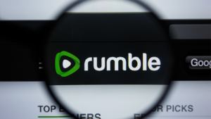 Illustrative Editorial of RUMBLE.COM website homepage. RUMBLE (RUM) logo visible on display screen.