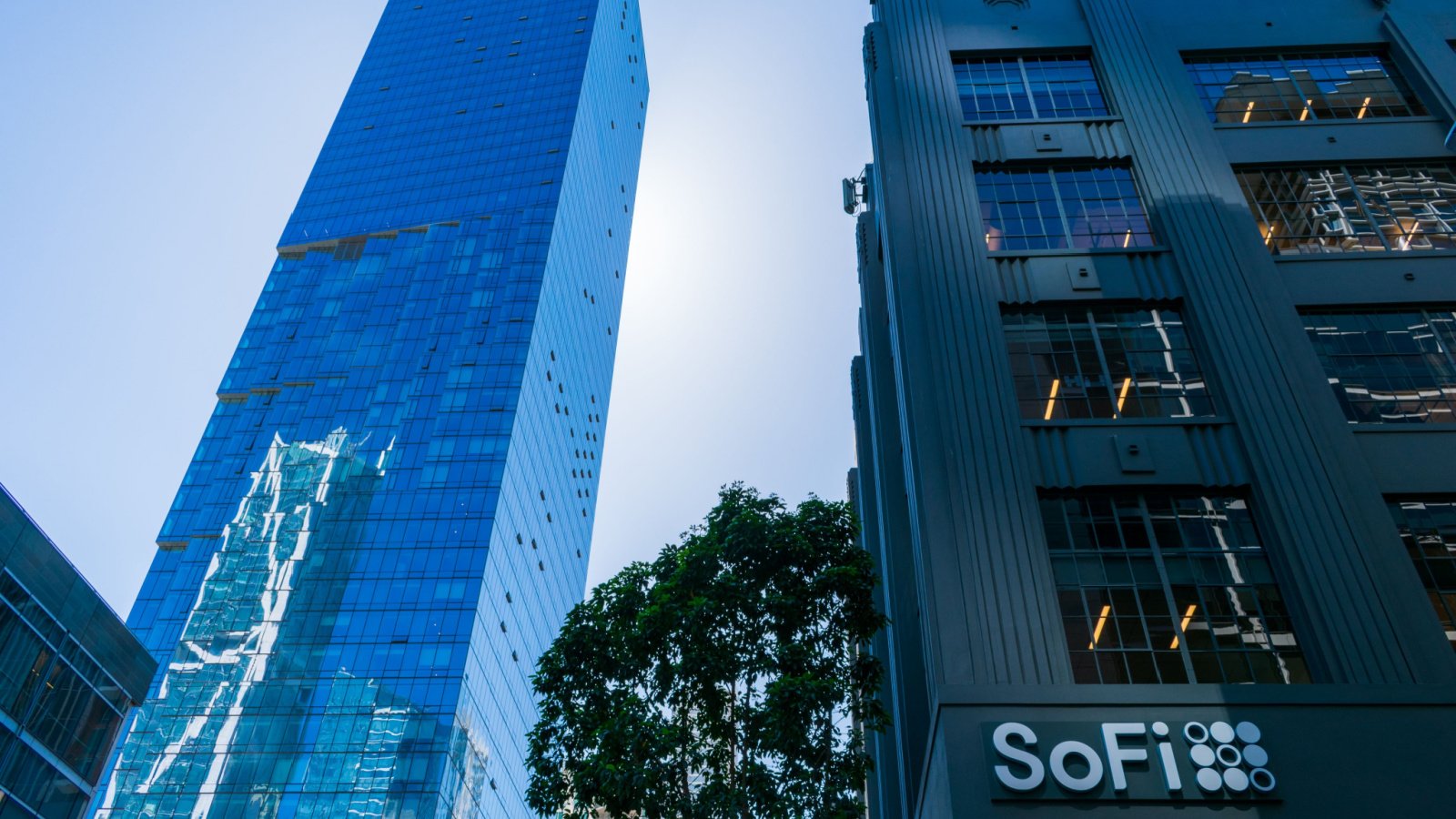 SoFi Technologies corporate building shown next to neighboring skyscraper during the daytime