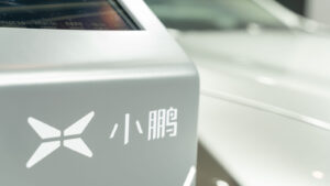 Silver door of Xpeng (XPEV) EV with company logo