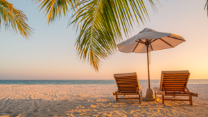 Beautiful beach. Chairs on the sandy beach near the sea. Summer holiday and vacation concept for tourism. Inspirational tropical landscape. Tranquil scenery, relaxing beach, tropical landscape design. SLNA stock