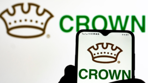 In this photo illustration Crown Holdings, Inc. (CCK) logo seen displayed on a smartphone in the background.