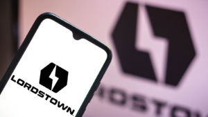 In this photo illustration the Lordstown Motors Corporation (RIDE) logo seen displayed on a smartphone screen