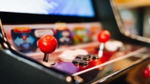 gaming stocks, Close up photo of arcade game buttons and toggle in arcade