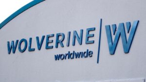 A close-up shot of the sign for Wolverwine Worldwide (WWW). 