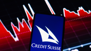 In this photo illustration, the swiss bank Credit Suisse Group (CS) logo is displayed on a smartphone screen
