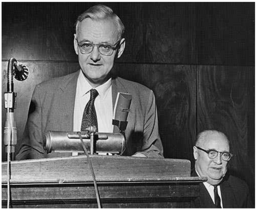 An image of Humphry Osmond speaking at a podium