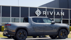 A new Rivian R1T truck appears at the Rivian service center in South San Francisco, California.  Rivian Automotive (RIVN) is an electric vehicle manufacturer.  RIVN stock price forecast
