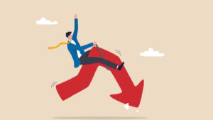 Graphic of man riding a downward stock arrow that is bucking like a horse, representing stocks to sell