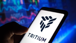 In this photo illustration the Tritium DCFC Limited logo seen displayed on a smartphone screen