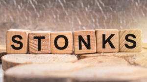 Wooden blocks with the word Stonks. Business and finance concept. meme stocks