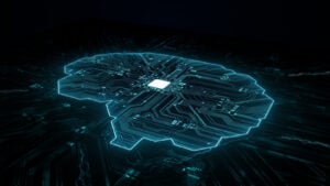 Black and cyber blue illustration of brain made out of light of circuit board with chip at the center of the brain, representing artificial intelligence (AI) stocks