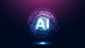 AI stocks to buy now, Graphic of letters "AI" in bold font surrounded by circle of tech symbols in purple and blue against a dark background. ai stocks to buy