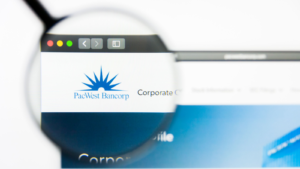 Illustrative Editorial of PacWest Bancorp (PACW) website homepage. PacWest Bancorp logo visible on display screen.