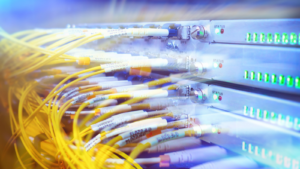 Rack Mounted Servers In A Server Room, Server rack audio cable. Severs computer in a rack at the large data center. Fiber Optical connector interface for Cards Equipment DWDM telecommunications. KLR stock