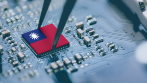 Flag of the Republic of China or Taiwan on a processor, CPU Central processing Unit or GPU microchip on a motherboard. Taiwan manufacturing chip industry emerges as battlefront in US - China showdown. TSM stock