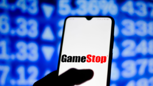 In this photo illustration the GameStop (GME) logo seen displayed on a smartphone screen.