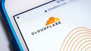 The logo of Cloudflare, (NET) an US web infrastructure & security company, its website on iOS.