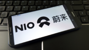 Nio Chinese automobile manufacturer logo displayed on mobile phone