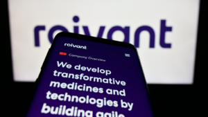 Mobile phone with webpage of biotechnology company Roivant Sciences Ltd. (ROIV) on screen in front of business logo. Focus on top-left of phone display. Unmodified photo.