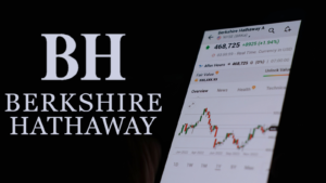 Berkshire Hathaway (BRK-A, BRK-B) logo, stock trade and chart on smartphone. Business and finance market.