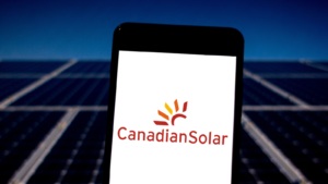 Canadian Solar (CSIQ) logo on a mobile device. Canadian is a company that manufactures photovoltaic modules and provides turnkey solar energy solutions.