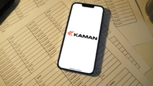 Kaman (KAMN) logo displayed on smartphone, representing KAMN stock
