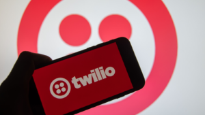 The brand logo of the US company "Twilio" on the display of a smartphone (focus on the brand logo), TWLO stock