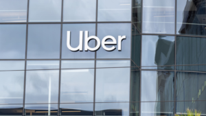 Uber sign at its headquarters building in San Francisco, California, USA - June 6, 2023.  Uber Technologies is a transportation conglomerate.