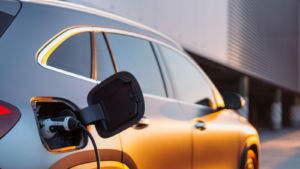 Close-up of electric car charging, ecology transportation concept. EV stocks