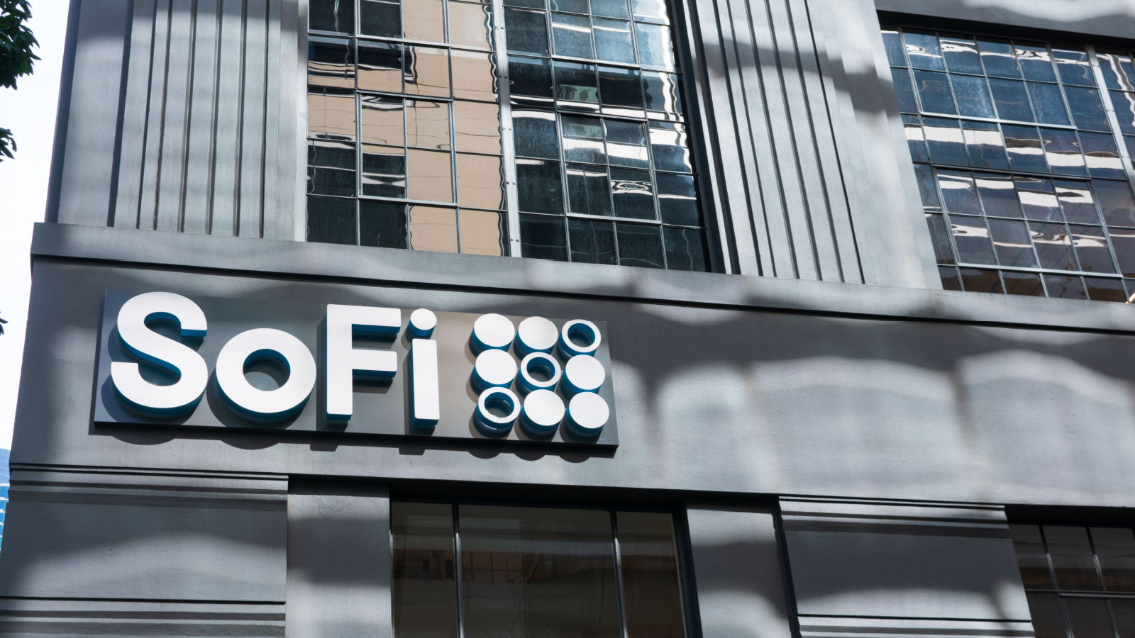 SoFi logo sign on headquarters facade. Social Finance is an online personal finance company.