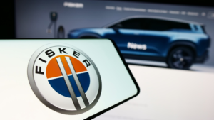 Smartphone with logo of American electric vehicle company Fisker Inc. in front of business website. Focus on center of phone display. Unmodified photo. Fisker stock. FSRN stock