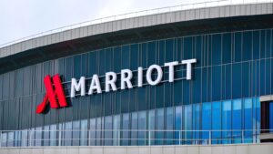 The front of a Marriott (MAR) building featuring the company name and logo.