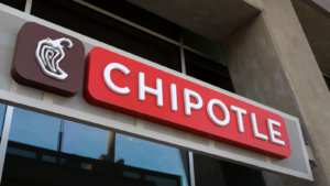 Chipolte Mexican Grill sign. Chipolte is a chain of casual dining restaurants specializing in burritos and tacos. CMG stock