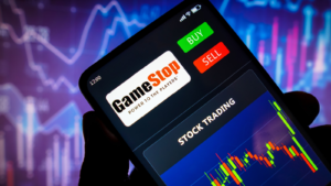 In this photo illustration the stock trading graph of GameStop seen on a smartphone screen. GME stock