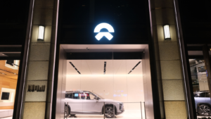 Retail display of NIO store at night. NIO is a Chinese electric car brand