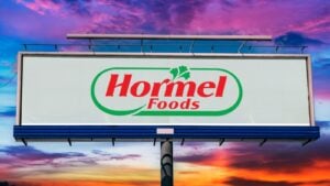 Advertisement billboard displaying logo of Hormel Foods, a food processing company founded in Austin, Minnesota, USA