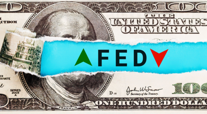 The Federal Reserve FED wording with up and down arrow on USD dollar banknote for Federal reserve increase and decrease interest rate control which effect to America and world economic growth concept.