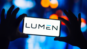 In this photo illustration, the Lumen Technologies logo is seen displayed on a smartphone. LUMN stock