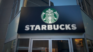 Starbucks coffee office building storefront logo signage on Metcalfe street in the downtown core of the Capital city of Canada. SBUX stock